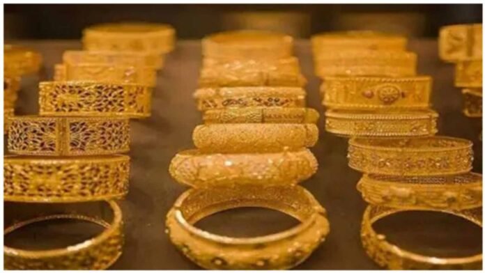 gold-silver-prices-fall-profit-booking Gold and silver bars showing slight price decline amid profit booking in the commodity market