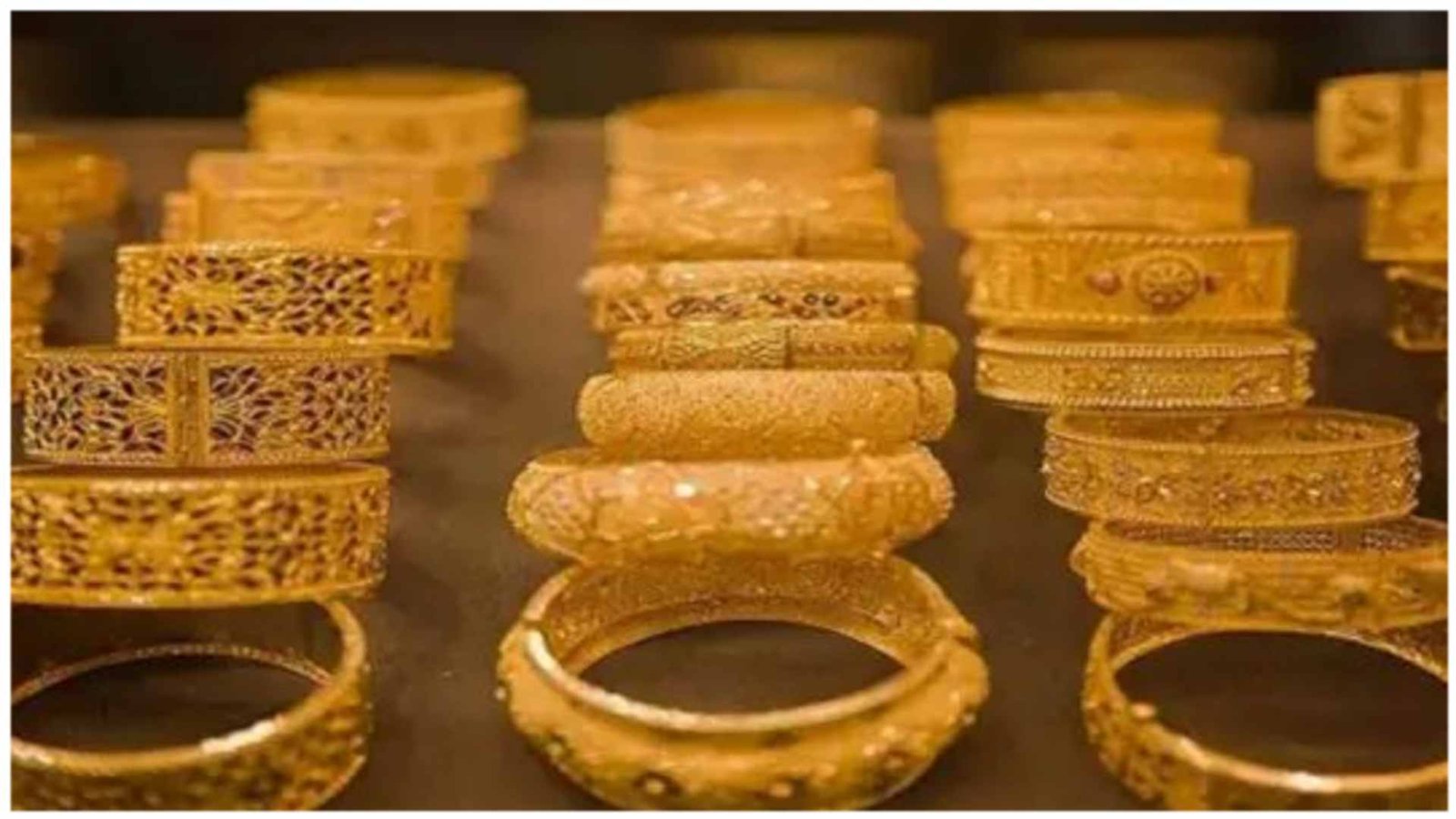 Gold and silver bars showing slight price decline amid profit booking in the commodity market